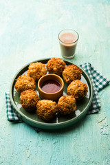 Crispy Noodles/maggie Pakora or pakoda is a popular indochinese street food served with ketchup