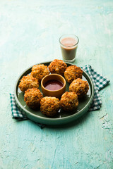 Crispy Noodles/maggie Pakora or pakoda is a popular indochinese street food served with ketchup