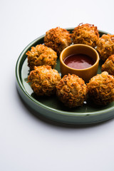 Crispy Noodles/maggie Pakora or pakoda is a popular indochinese street food served with ketchup