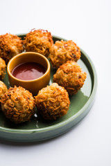 Crispy Noodles/maggie Pakora or pakoda is a popular indochinese street food served with ketchup