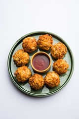 Crispy Noodles/maggie Pakora or pakoda is a popular indochinese street food served with ketchup