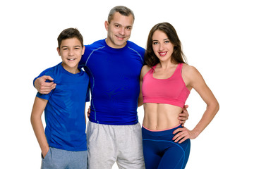 Happy sporty family portrait on white background
