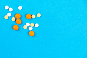 Tablets medicaments on a blue background