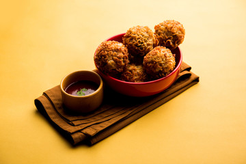 Crispy Noodles/maggie Pakora or pakoda is a popular indochinese street food served with ketchup