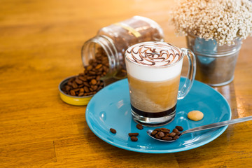  Coffee mugs and coffee beans