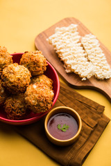 Crispy Noodles/maggie Pakora or pakoda is a popular indochinese street food served with ketchup