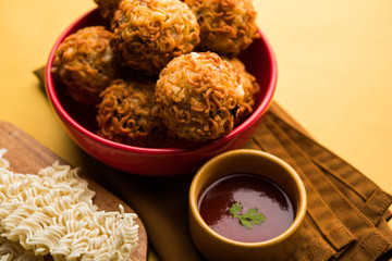 Crispy Noodles/maggie Pakora or pakoda is a popular indochinese street food served with ketchup