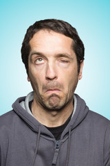 Close-up of man with expression of forgetfulness