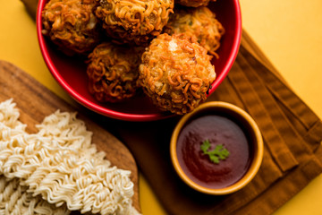 Crispy Noodles/maggie Pakora or pakoda is a popular indochinese street food served with ketchup