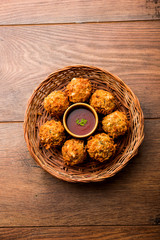 Crispy Noodles/maggie Pakora or pakoda is a popular indochinese street food served with ketchup