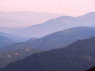 Fototapeta premium Carpatian village at mountains at the sunny day