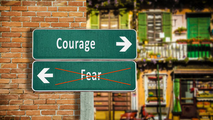 Fototapeta premium Street Sign to Courage versus Fear