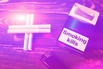 Smoking kills sign on the pack of cigarettes. Dangerous habit. Harmful for health.