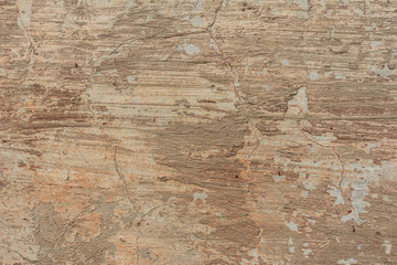 Texture of a concrete wall with cracks and scratches which can be used as a background