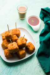 Crispy Paneer popcorn is a popular party snack and an appetiser. selective focus