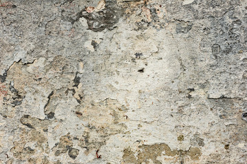 Texture of a concrete wall with cracks and scratches which can be used as a background