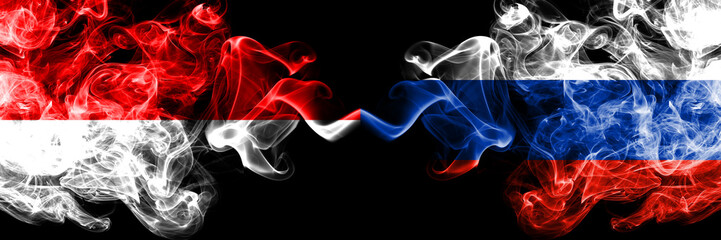 Indonesia vs Russia, Russian smoky mystic flags placed side by side. Thick colored silky smoke flags of Indonesia and Russia, Russian