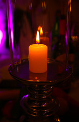Romantic candle light in the dark.