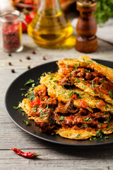 Hungarian potato pancake with goulash