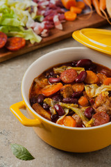 Traditional portuguese goulash with cabbage, beans and ribs.