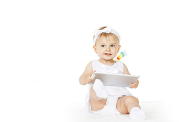 little girl all in white with tablet and toy