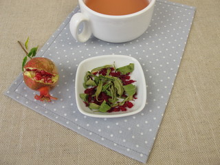 Pomegranate tea with dried pomegranate leaves and dried pomegranate petals