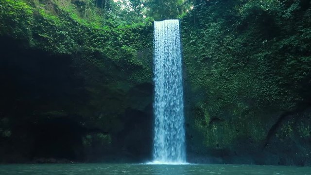 Timbumana Waterfall In A Secluded Jungle With A Perfect Bridal Veil Into A Pool in Ubud, Bali, Indonesia