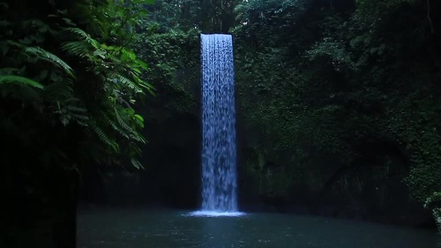 Timbumana Waterfall In A Secluded Jungle With A Perfect Bridal Veil Into A Pool in Ubud, Bali, Indonesia