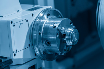 Fototapeta premium Close up the check of the CNC lathe machine. The hi-precision metal working by turning machine .