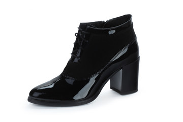 Female autumn-winter leather ankle  boots isolated on white background