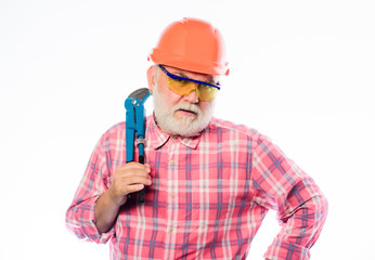 architect repair and fix. engineer worker. build and construction. professional repairman in helmet with gas wrench. mature bearded man in hardhat. man builder. Everything should be perfect