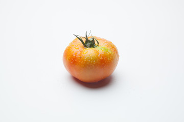 Tomate rojo, maduro, preparado para ser comido, ya sea crudo o cocinado