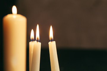 Candle flame close up on a black background