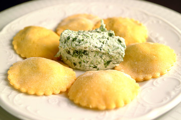 Italian fresh pasta Panzerotti stuffed with ricotta cheese and spinach.