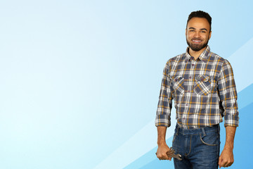 Fototapeta premium Portrait of stong and handsome african male student looking at camera smiling