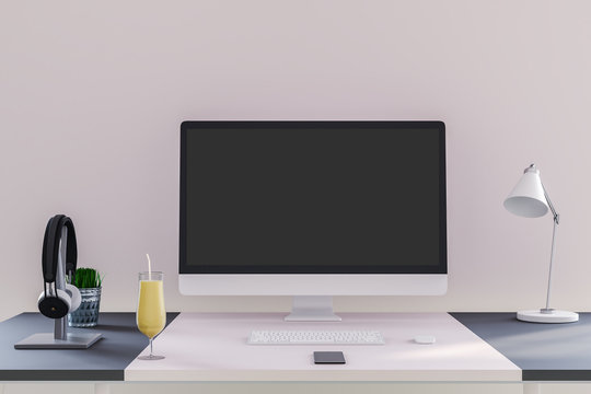Designer desk with computer