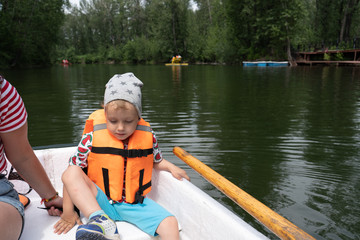 little boy in boat