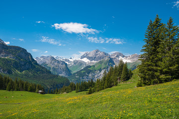 Scenic view between Oeschinen mountain station and Oeschinensee lake close to Kandersteg