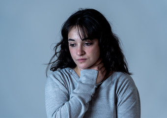 Fototapeta premium Human expressions and emotions. Young attractive woman with sad and depressed expression