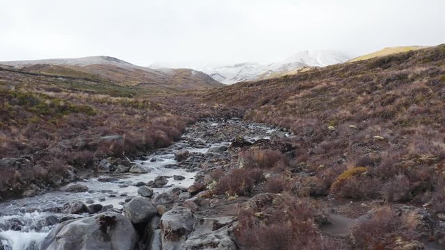 Wild landscape of New Zealand's Tongariro Crossing and Mt Ruapehu volcanic ground