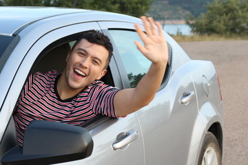 Educated driver saluting a friend 