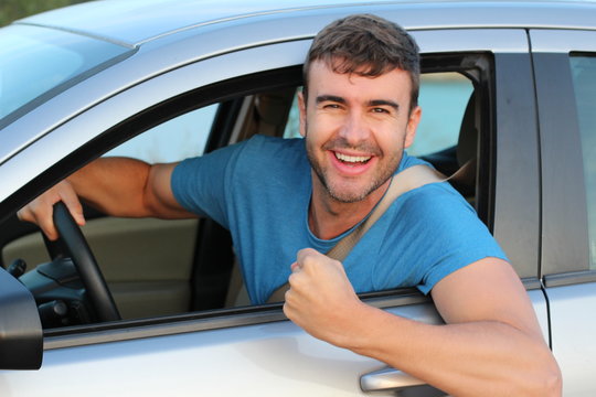 Cheerful Driver Celebrating A Victory