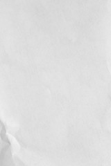 Grey crumpled textured paper background