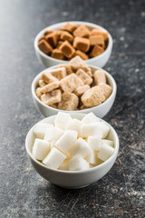 White and brown sugar cubes.