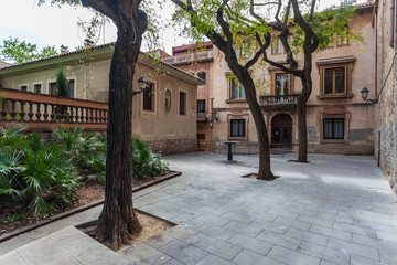 Little square in historic center of quarter of Sarria, Barcelona, Catalonia, Spain.