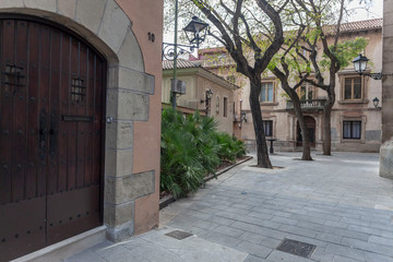 Little square in historic center of quarter of Sarria, Barcelona, Catalonia, Spain.