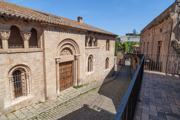 Fototapeta premium Ancient street in old walled enclosure of Monastery of Pedralbes, Barcelona, Catalonia, Spain.