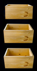 set of empty wooden boxes on black