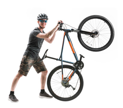 Young Man With Mountain Bike Isolated On White.