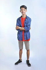 Confidence Asian young man wear casual t-shirts with confident smiling